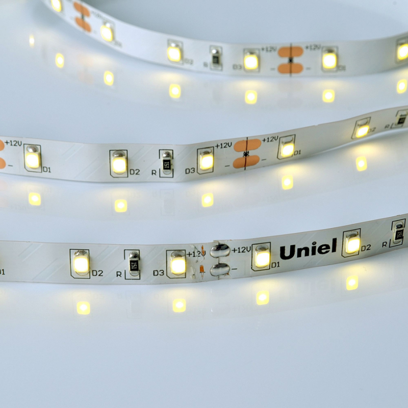 Светодиодная лента Uniel ULS-M11-2835-60LED/m-8mm-IP20-DC12V-4,8W/m-5M-4000K PROFI катушка в герметичной упаковке